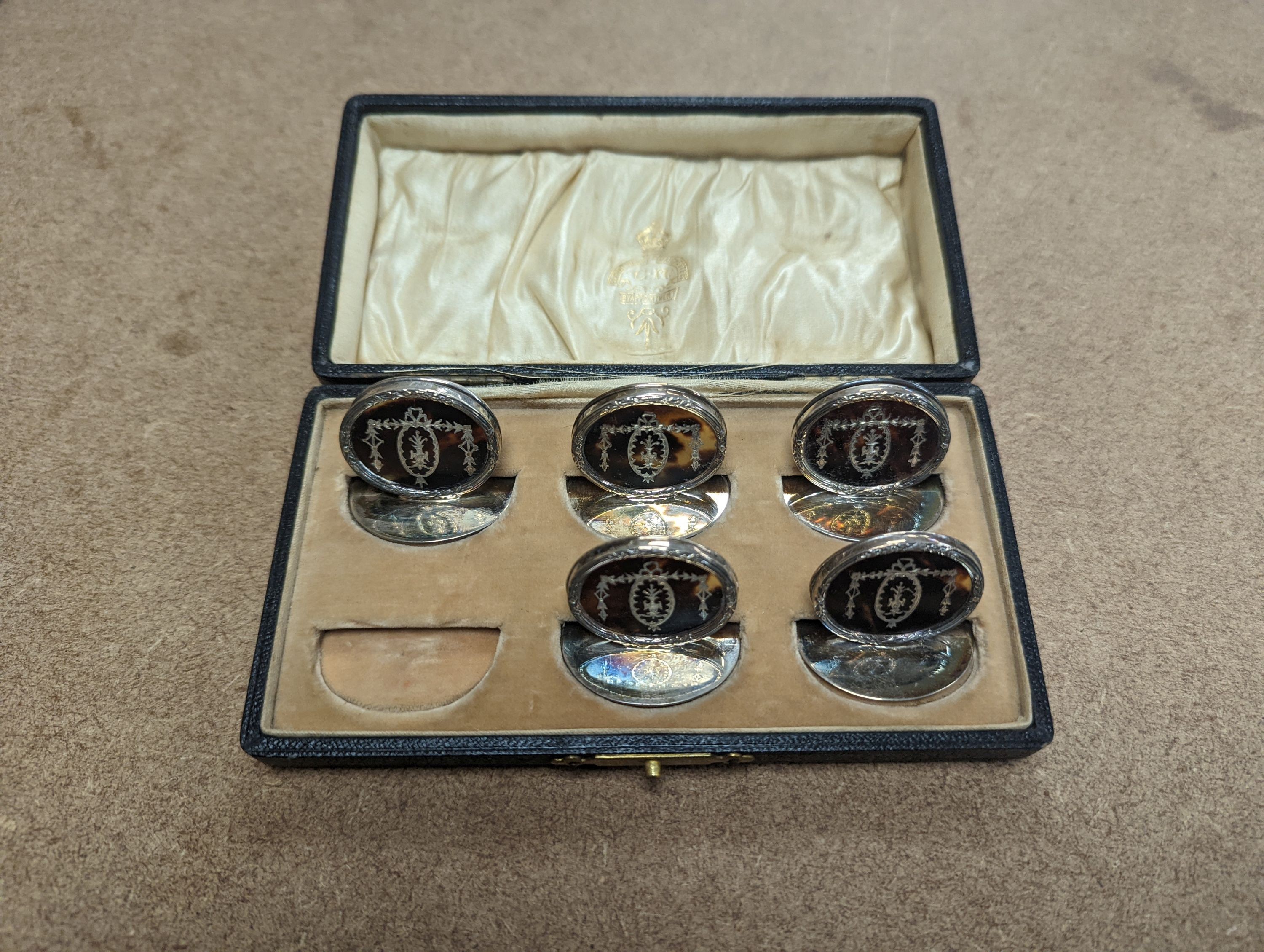 A collection of assorted sterling or silver items, including a cased set of five (ex 6) silver and tortoiseshell menu holders, bowls, mugs, flatware, three cased salts, pairs of serving spoons, etc and other white metal